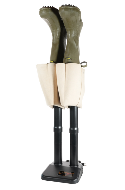 A pair of olive green wader hip boots inserted onto an extra tall black boot dryer shown against a plain white background.